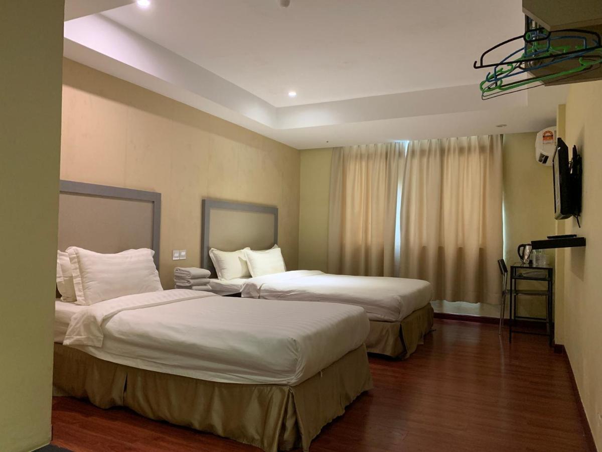 Mcity Inn Мири Экстерьер фото